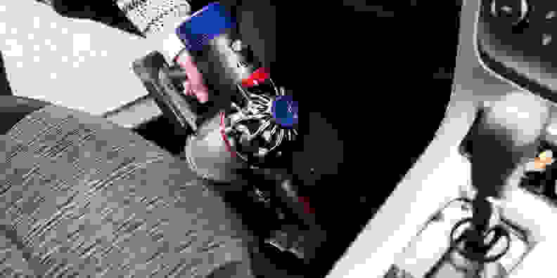 The Dyson V8 Absolute cleaning a car, during testing to find the best cordless vacuum