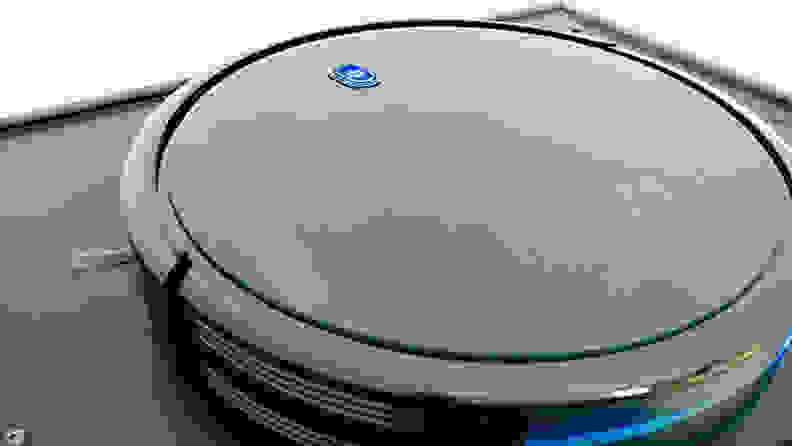 A close-up of the Eufy Robovac 11S robot vacuum.