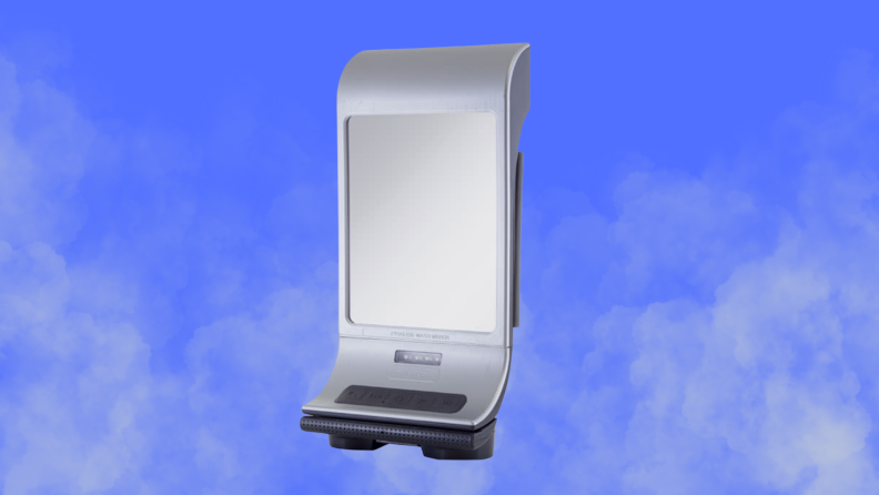 A shower mirror sits on a steamy blue background background