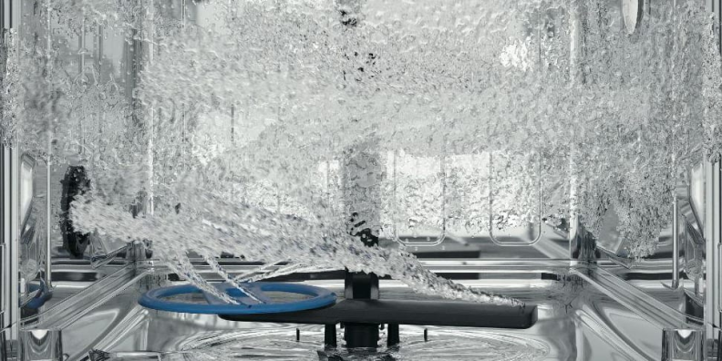 Water spinning around inside of a dishwasher.